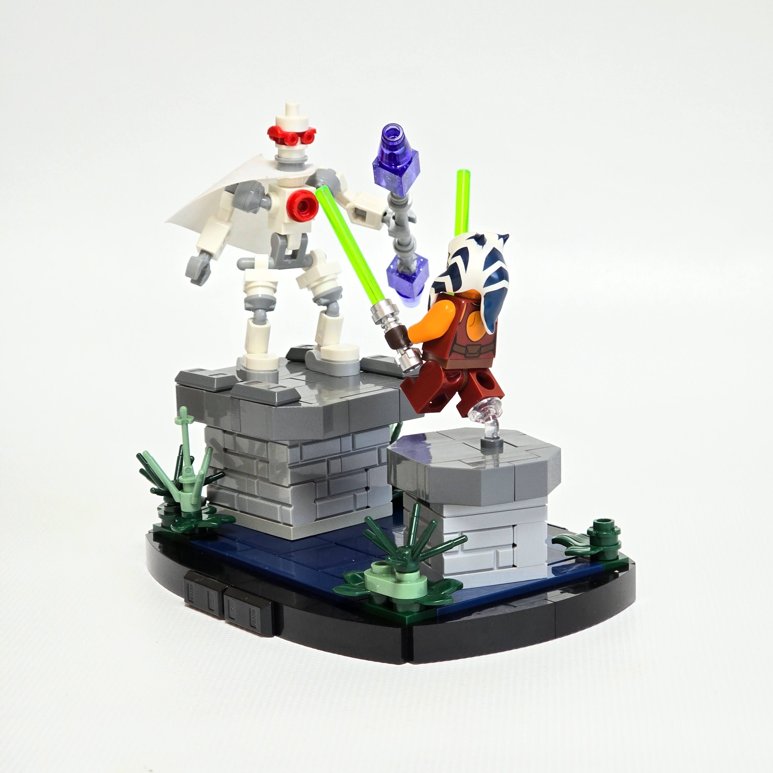 Lego young Ahsoka Tano fighting a magnaguard, created by Alex Lyman