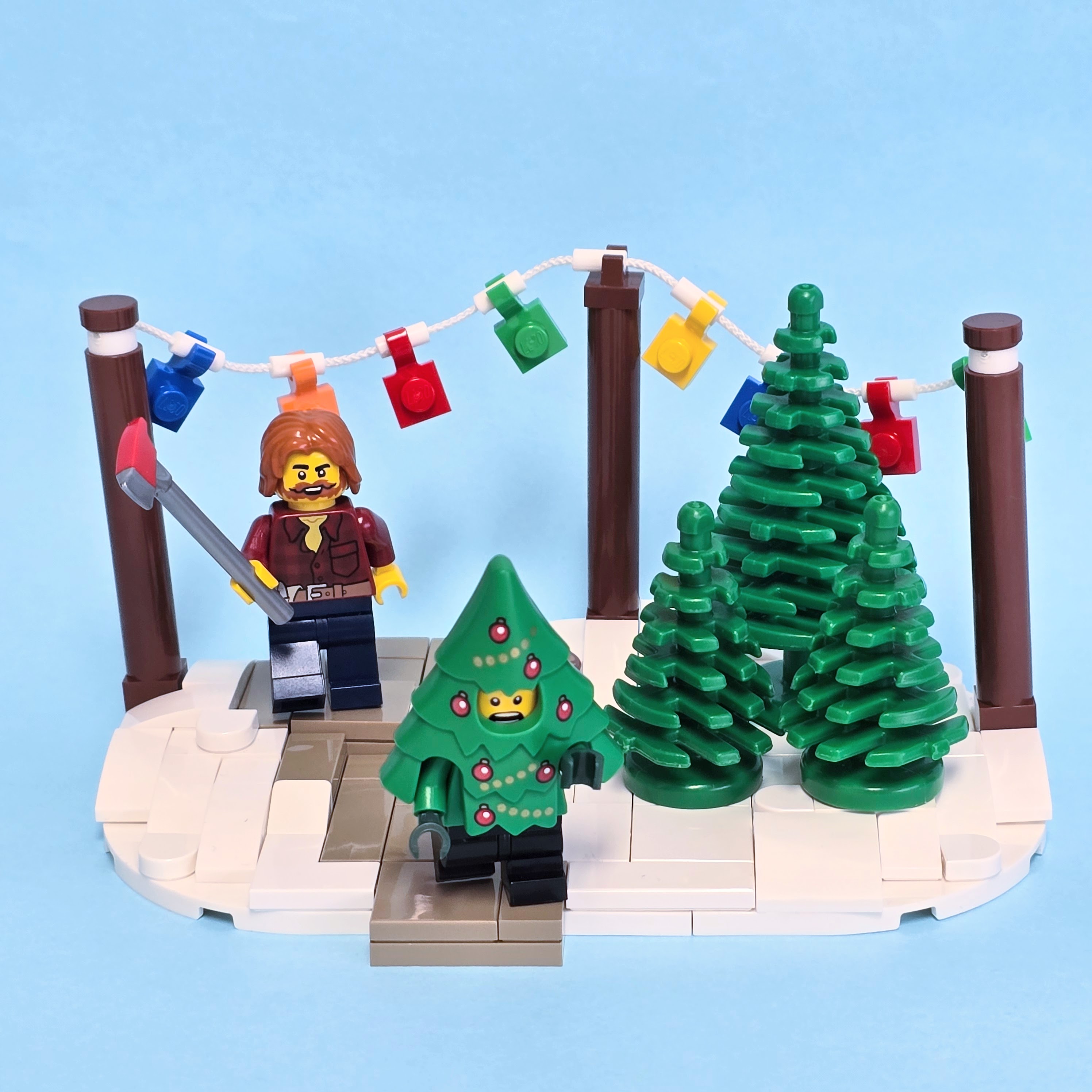 Lego Lumberjack chasing a boy in a tree costume, created by Alex Lyman